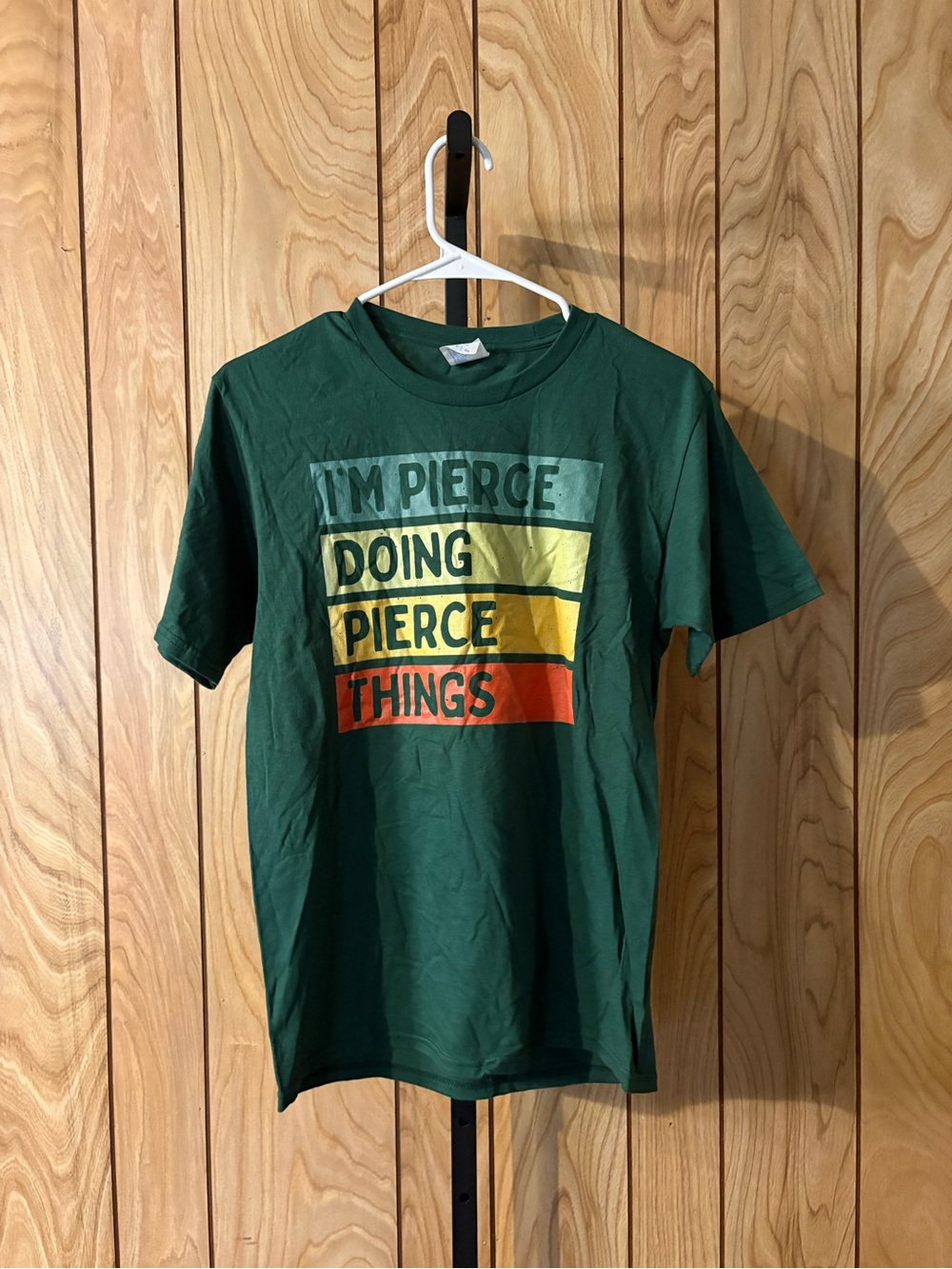Port and Company Green Tee with Blue, Yellow, Orange and Red Stripe Graphic